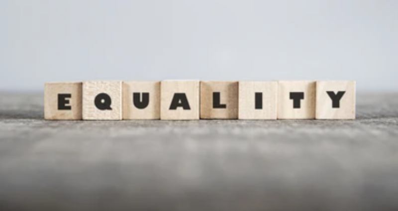 Equality spelled out on wooden blocks