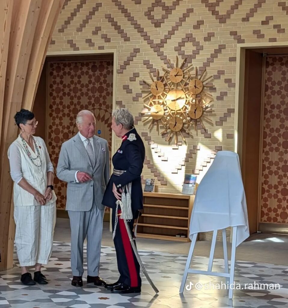 The photograph shows King Charles, Katie Thornburrow and Julie Spence, Lord Lieutenant of Cambridgeshire. It was taken by Shahida Raman.